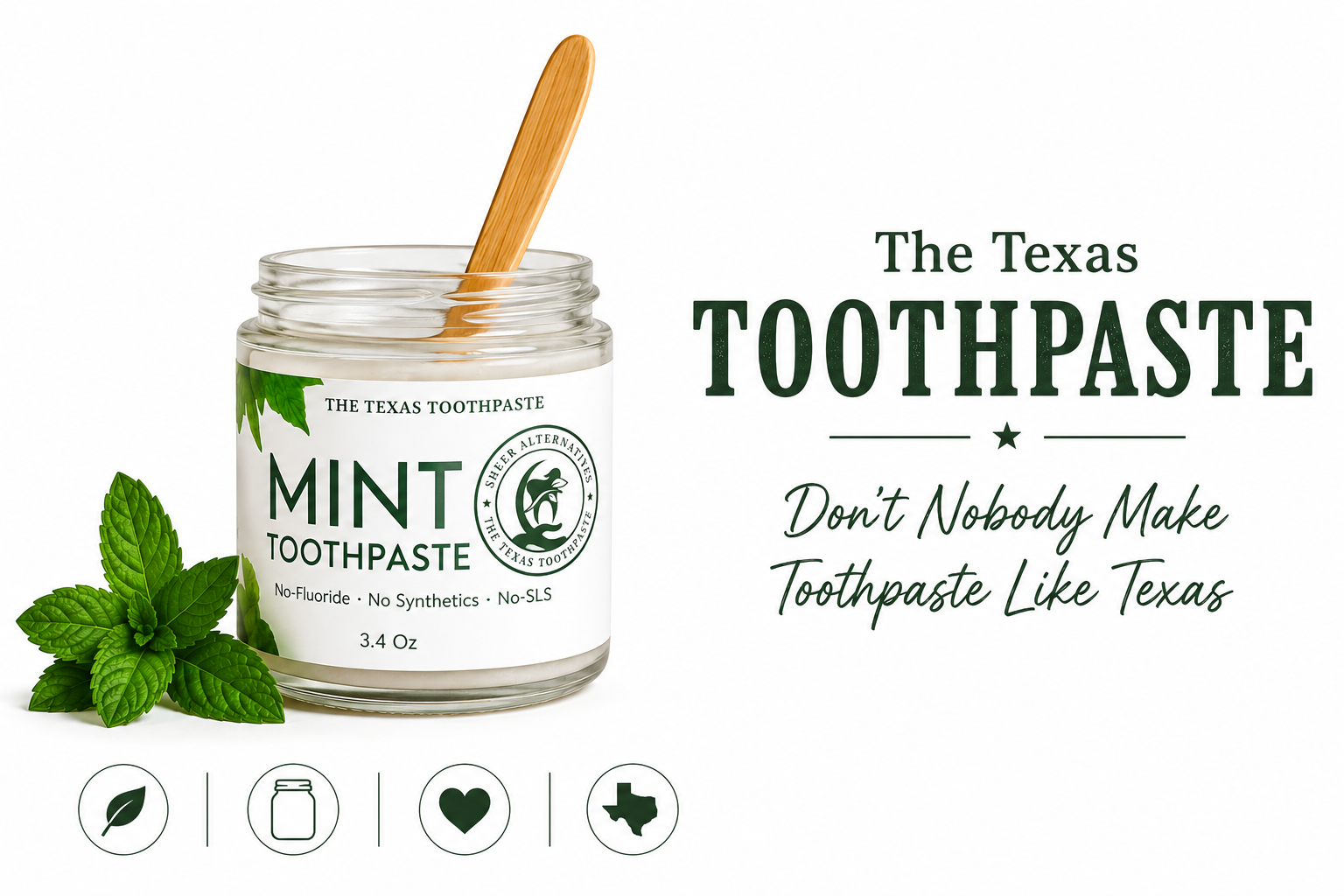 Jar of 'The Texas Toothpaste' mint toothpaste with a wooden spoon and mint leaves on a white background.