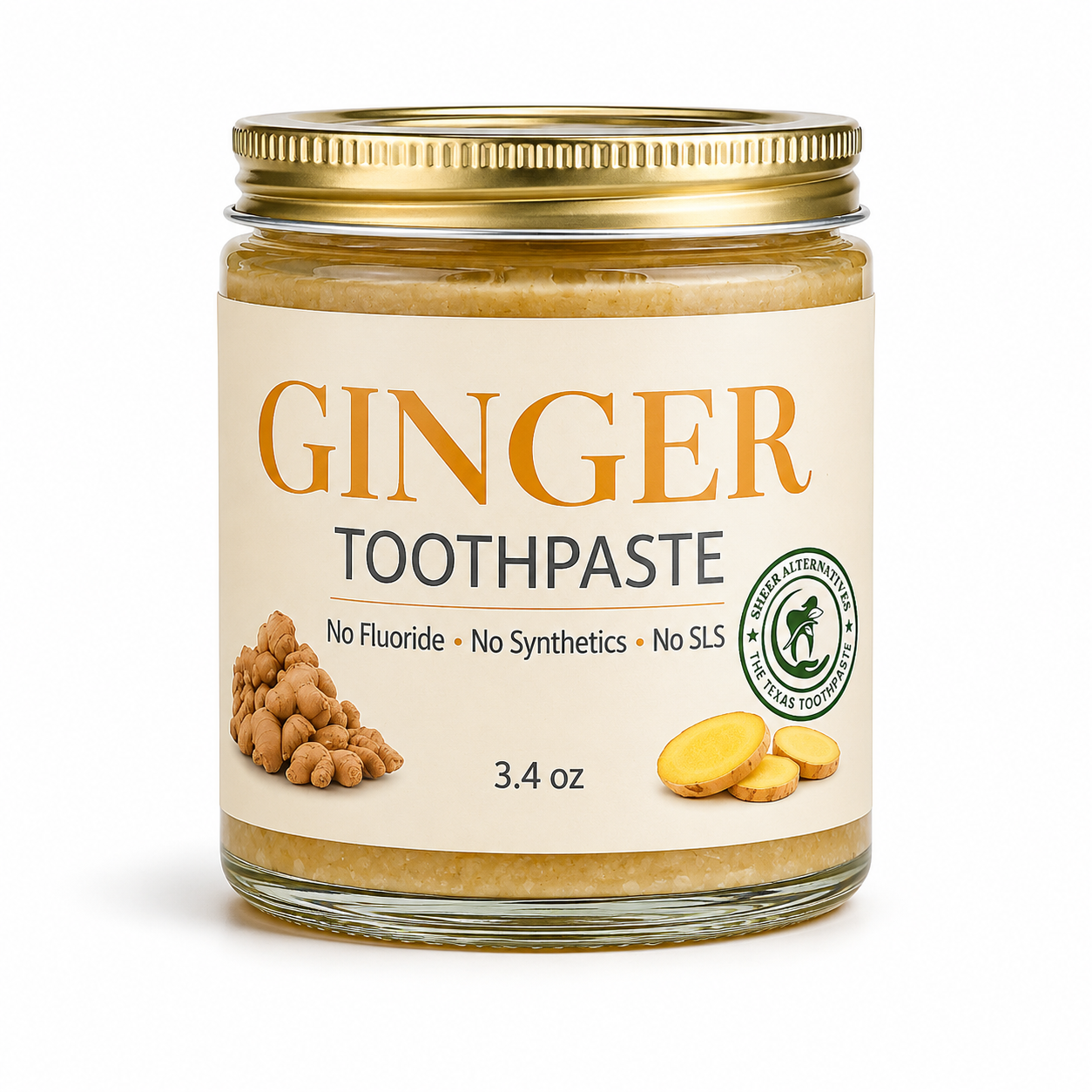 Jar of ginger toothpaste with a gold lid on a white background