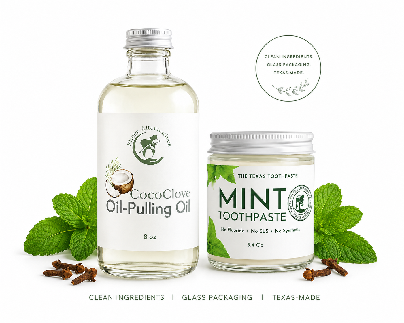 CocoClave oil-pulling oil bottle and The Texas Toothpaste mint toothpaste jar with mint leaves on a white background.