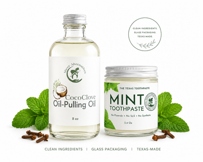 CocoClave oil-pulling oil bottle and The Texas Toothpaste mint toothpaste jar with mint leaves on a white background.